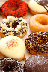 Image showing Varieties of decorated donuts