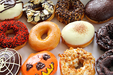 Image showing Varieties of decorated donuts