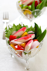 Image showing Crab stick with pepper and lettuce salad