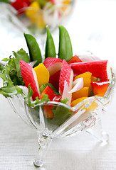 Image showing Crab stick with pepper and lettuce salad