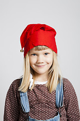 Image showing Smiling girl wearing Christmas hat