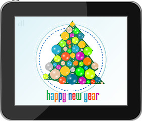 Image showing christmas tree with balls on tablet pc