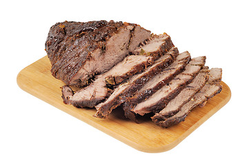 Image showing Roast beef on a wooden board