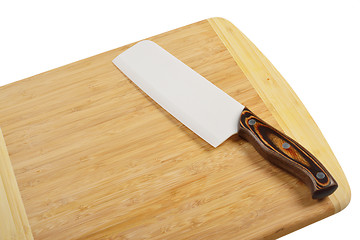 Image showing Wooden cutting board with knife