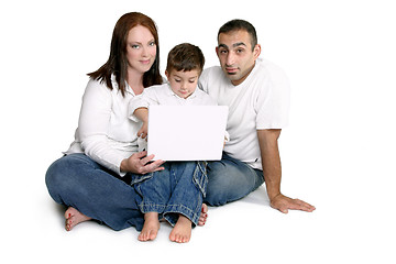 Image showing Family with child on computer