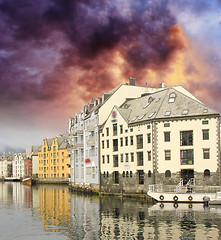 Image showing Small harbor in downtown of Alesund, with Reflections - Norway