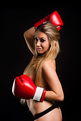 Image showing beautiful nude girl with boxing gloves