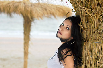 Image showing Nice young brunette on a beach