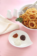 Image showing Onion Rings And Condiments