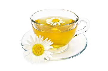 Image showing Herbal tea in a glass cup with daisies