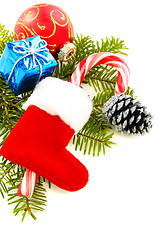 Image showing Christmas toys and pine cone.