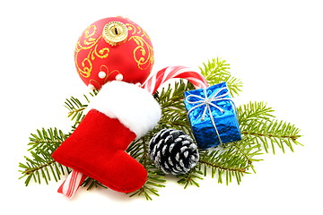 Image showing Santa's stocking, pine cones and Christmas toys.