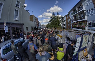 Image showing LONDON - SEP 28: Visitor watches shops and market on September 2