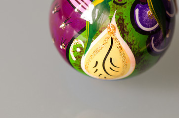 Image showing Classic Christmas ball green blue yellow and glossy isolated on 