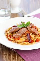 Image showing Spaghetti with sausage and tomato