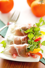 Image showing Smoked ham with vegetables and pomegranate