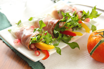 Image showing Smoked ham with vegetables and pomegranate