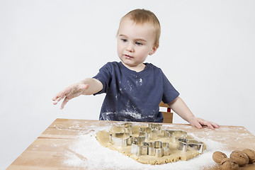 Image showing child making cookies