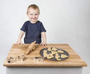 Image showing child making cookies