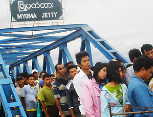 Image showing People crossing the border to go into Myanmir (formerly Burma) -