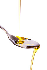 Image showing olive oil poured into spoon