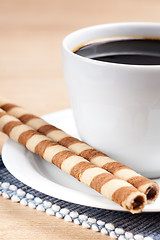 Image showing coffee rolls and cup