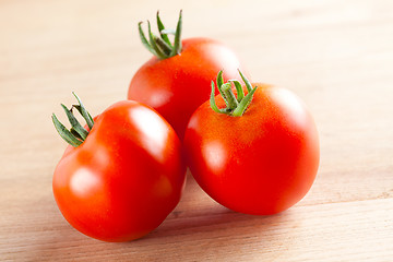 Image showing red tomatoes on table