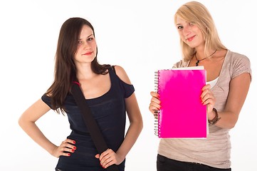 Image showing Two beautiful student girls getting ready for school