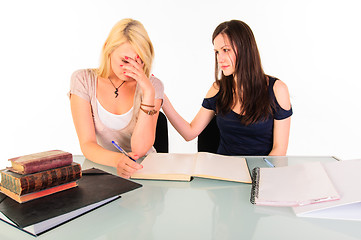 Image showing Two beautiful student girls getting ready for school