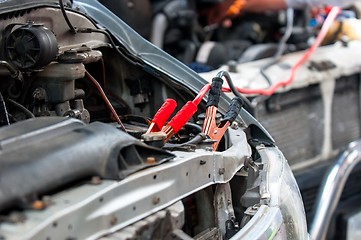 Image showing Charging car with electricity