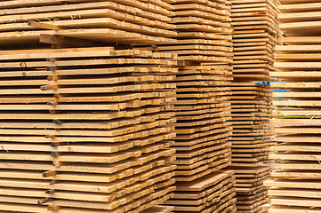 Image showing Stacked up wood