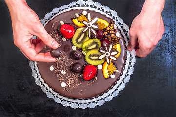 Image showing Confectioner and his cake