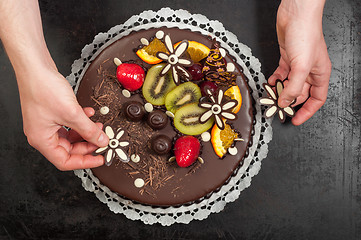 Image showing Confectioner and his cake