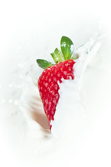 Image showing strawberry splashing into milk