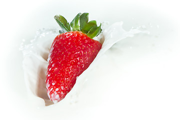 Image showing strawberry splashing into milk