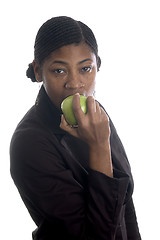 Image showing pretty black woman eating apple