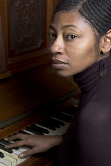 Image showing pretty black woman at piano