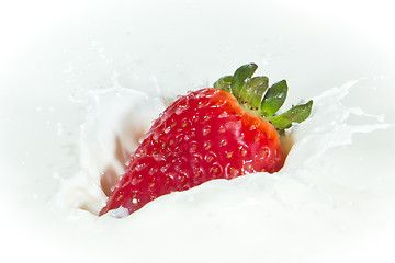 Image showing strawberry splashing into milk