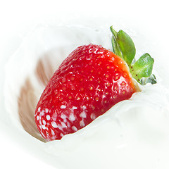 Image showing strawberry splashing into milk