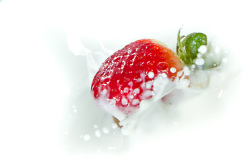 Image showing strawberry splashing into milk