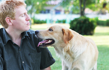 Image showing Man in the park with his dog