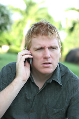 Image showing Man on the phone with a angry or confused expression