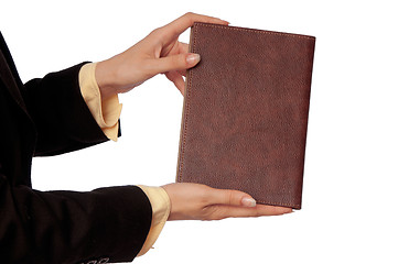 Image showing woman holds the business book