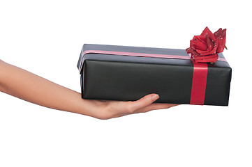 Image showing black box with red ribbon as a gift