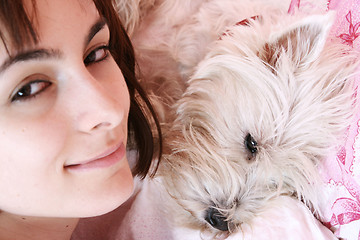 Image showing Dog sleeping on bed 