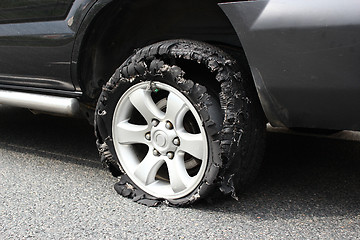 Image showing exploded truck tire 