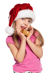 Image showing Little girl with gift box