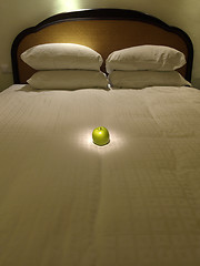 Image showing Apple in bed