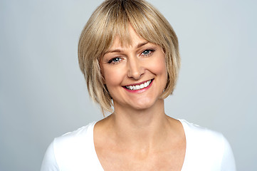 Image showing Portrait of a smiling middle aged caucasian woman