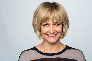 Image showing Happy middle aged woman posing for a portrait